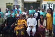 Rev Boamah (seated, second from left) in a group photograph with some dignitaries and contestants