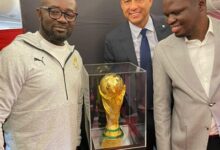From left: Messrs Okraku, Trezeguet and Ussif pose with the FIFA World Cup