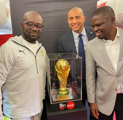 From left: Messrs Okraku, Trezeguet and Ussif pose with the FIFA World Cup