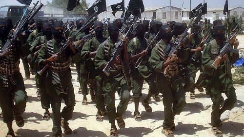 Hundreds of newly trained al-Shabab fighters perform militaty exercises in the Lafofe area of Mogadishu