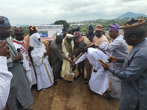 The National Chief Imam (middle) cutting the sod