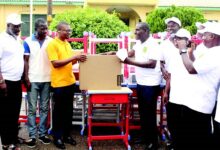 • Mr John Gerald Essel (fourth from right), Chairman, OSSA 1981 year group presenting the items to Mr Patrick Mensah,Headmaster,Odorgonno SHS. With them are members of the group. Photo: Ebo Gormanto