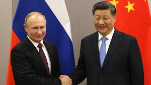 Mr Putin (left) and Mr Xi