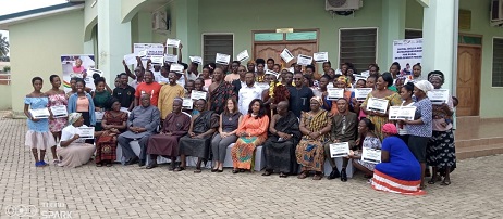 Mrs Andoh-Poku (seated fourth right) Brakwante Agyeman (seated third right) and Ms Huber (fifth right) with the beneficiaries in a group picture.