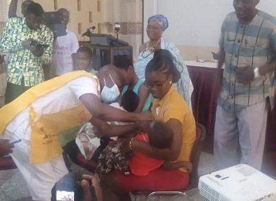 A health worker going through the exercise for a parent after the engagement