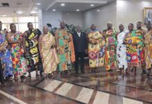 President Akufo-Addo (middle) with chiefs from the Bono East Regional House of Chiefs after a meeting at the Jubilee House