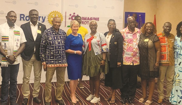 Ms Jones (fourth from left) with other Rotarians