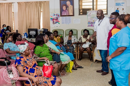 Dr Adomako-Kissi(third from right) interacting with the pregnant women
