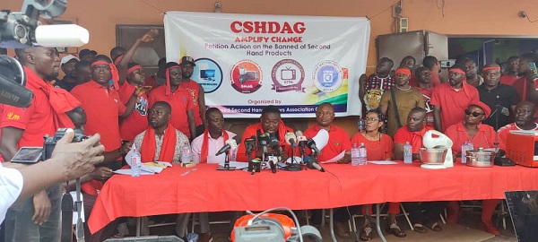 Mr Asante (third from left) briefing the media
