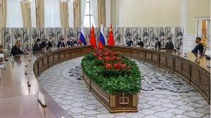 • Mr Putin (far left) and Mr Xi (far right) met at the Shanghai Cooperation Organization summit in Samarkand