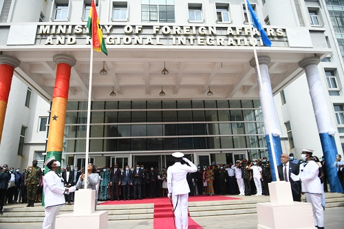 Ms. Shirley Ayorkor Botchwey (second from left) and Mr. Charles Abani (second from right) hoisting the Ghana and UN Flags respectively. Photo Geoffrey Buta