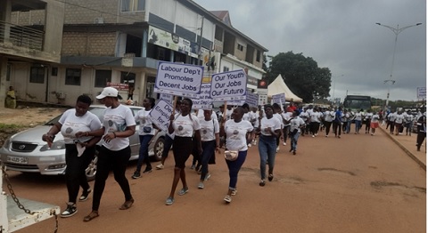 Participants marching through the principal streets of Sunyani