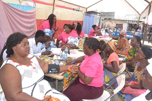 Ms Sowah(forth from left) interacting with a nurse during the execise Photo Victor A. Buxton