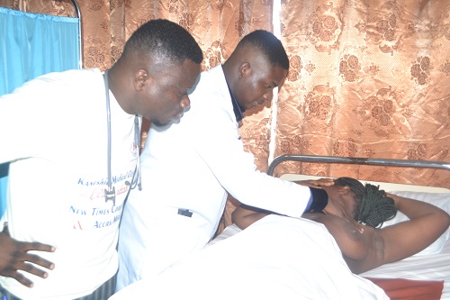 A Medical officers examining one of the women during the exercise