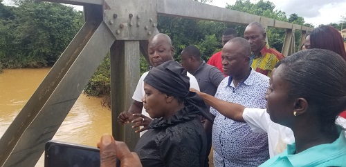 Ms Dapaah and others dignitaries at one of the water bodies during the tour