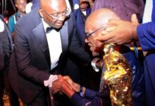 Vice President Bawumia (left) paying homage to the decorated veteran journalist at the event