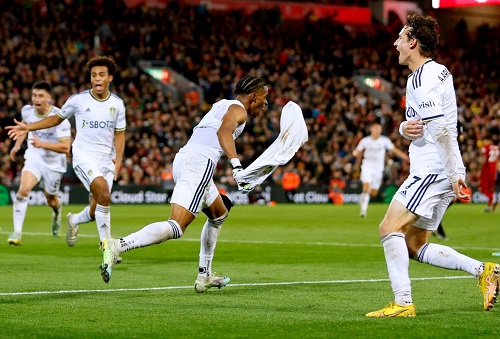 Leeds' late goal scorer, Summerville (centre) and teammates celebrate the winning goal