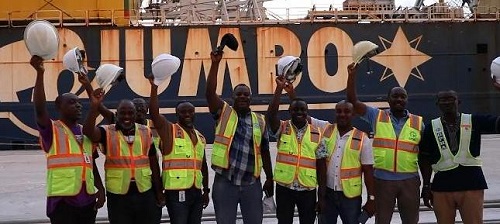 Capt. Quayson (middle), Dr Kingsley Antwi-Boasiako, Marketing and Public Affairs Manager, Port of Takoradi (3rd, left) and other staff hailing the arrival of MV Fair Partner.