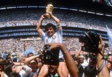 Maradona lifting aloft the 1986 World Cup trophy