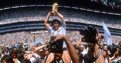 Maradona lifting aloft the 1986 World Cup trophy