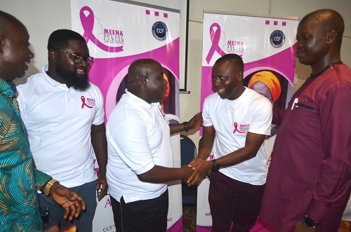 Mr. Ibrahim Oppong Kwarteng (second from right) thanking Mr Stephen Ofosu Agyare after he launched the project. Photo. Vincent Dzatse