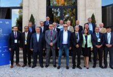 Merlo (middle, front row) with the elected executive of the AIPS