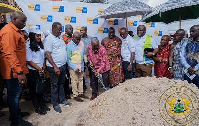 President Akufo-Addo with shovel breaking ground for the comencement of the project