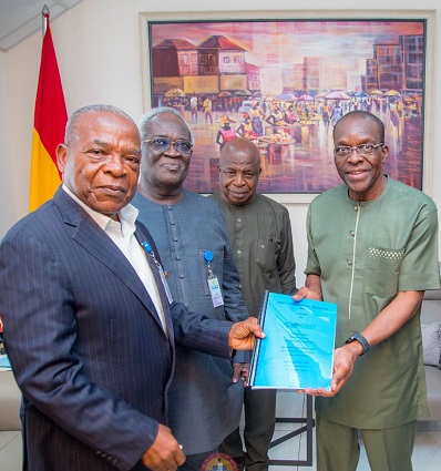 TRANSITION- Nana Dadzie (left) presenting the document to Mr Bagbin (right). Looking on are Prof Ahwoi (second, left) and Kofi Attoh, an official in the Office of The Speaker of Parliament