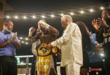WBO Africa Supervisor, Nr Samir Captan (right) decorates Quaye with the title