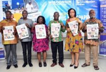 Prof. Audrey Gadzekpo (third from left) Prof. Obeng Mireku (third from right) Prof. Kwame Karikari, Dr. Baaba Cofie and other digniteries displaying the newspaper. Photo Geoffrey Buta