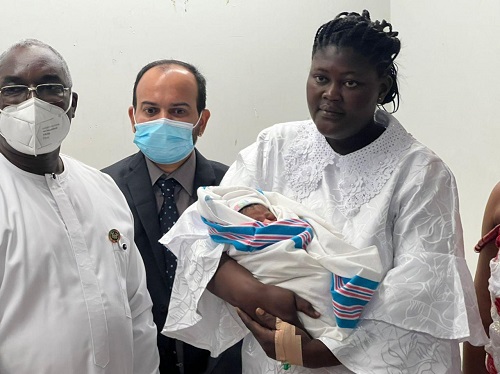 • Mother of the symbolic 8 billionth baby with Mr Barnabas Tisa (middle) and others at the Accra Regional Hospitalsyndrome