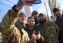 President Zelensky with soldiers on Monday