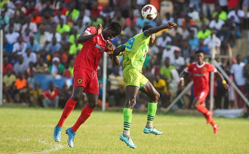 Bechem’s Cephas Kofi Mantey (right) flicks the ball past Augustine Agyapong in yesterday's game