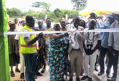 Kafabawura Seidu Yahaya (middle) and other dignitaries cutting tape to open the facility