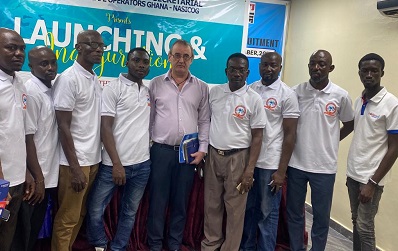 Mr Bruce Thomas Suallah (second from right) with other executives of NASICOG