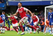 Ecstatic Arsenal players wheel away in celebration after scoring the only goal of the match