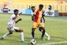 • Enoch Asubonteng (middle) in a tussle for the ball with Ishmael Dede and Ofori McCarthy Photo: Raymond Ackumey