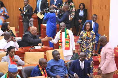 • Mr Ken Ofori-Atta being welcomed by parliamentarians to the floor of parliament Photo: Victor A. Buxton