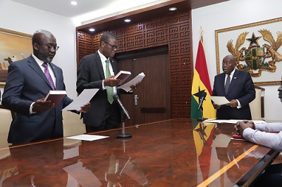 • President Akufo-Addo (right) swears in Mr Maxwell Awiaga (middle) and Mr Yaw Bimpong at the Jubilee House