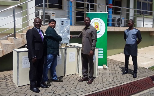 Dr Kuma-Aboagye (second from right) receiving the equipment from Mr Nilesh More (left), Managing Director of Nilex Co. Ltd