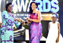 Portia Gabor(middle) 2021 Journalist of the Year receiving her from Ms Oboshie Sai Cofie