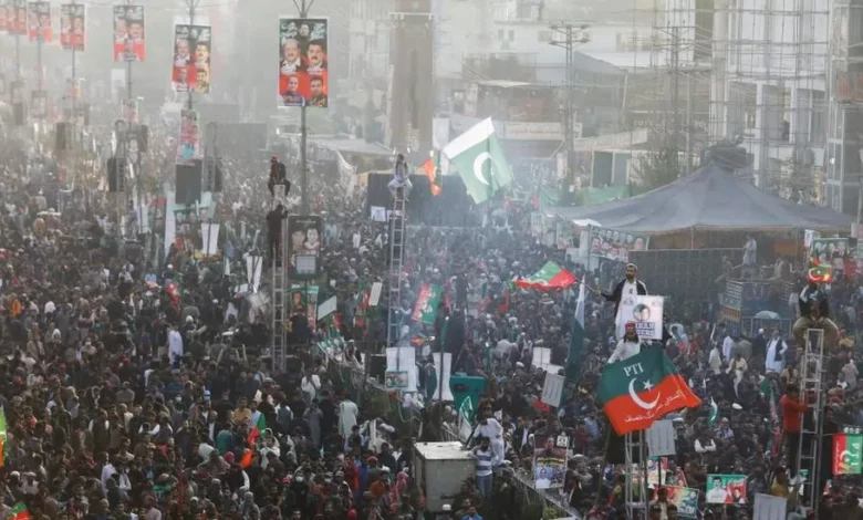Crowds gathered for a rally in the city of Rawalpindi, taking flags and signs