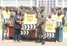 • Mrs Gloria Laryea (left) presenting the vests to Lt Col David Addi. With them are other officials Photo Anita Nyarko-Yirenkyi