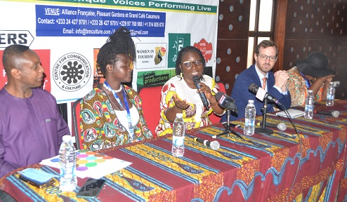 • Mrs Diana Hopeson (middle) speaking at the programme. With her are Mr Diego S. Vergara (second from right), Mr Carl Ampah (left) and others Photo: Victor A. Buxton