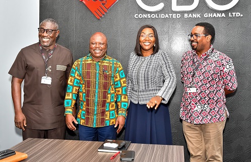 • Mr Cudjoe (second from left) with the management of CBG