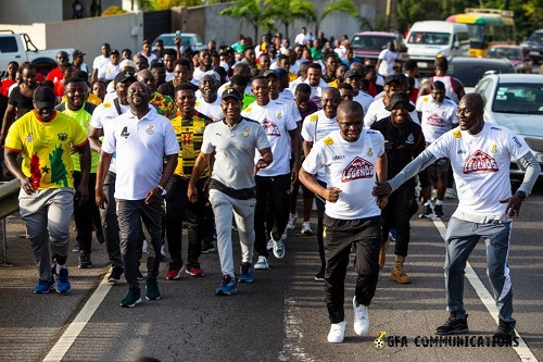 Mr Ussif (second right) leads the walk from Ayi Mensah