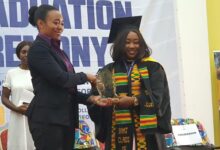 • Dr Zenator Agyemang-Rawlings (left) presenting the overall best student award to Lady Pearl Akpokli Photo: Godwin Ofosu Acheampong