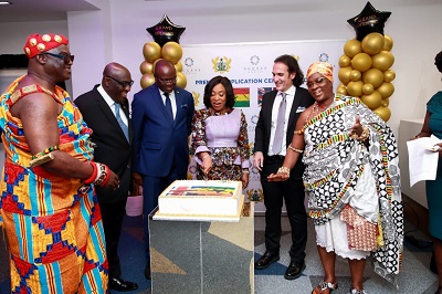 • Ms Botchwey (third from right) with Mr Owusu-Ankomah (second from left) and other dignitaries cutting the cake to officially open the centre