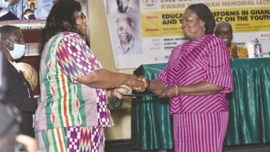 Prof Jane Naana Opoku-Agyemang (right ) receiving an award
