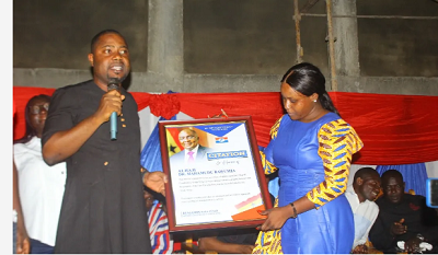 • Mr Mensah receiving a citation at the launch of the party’s youth wing in the Ekumfi Constituency
